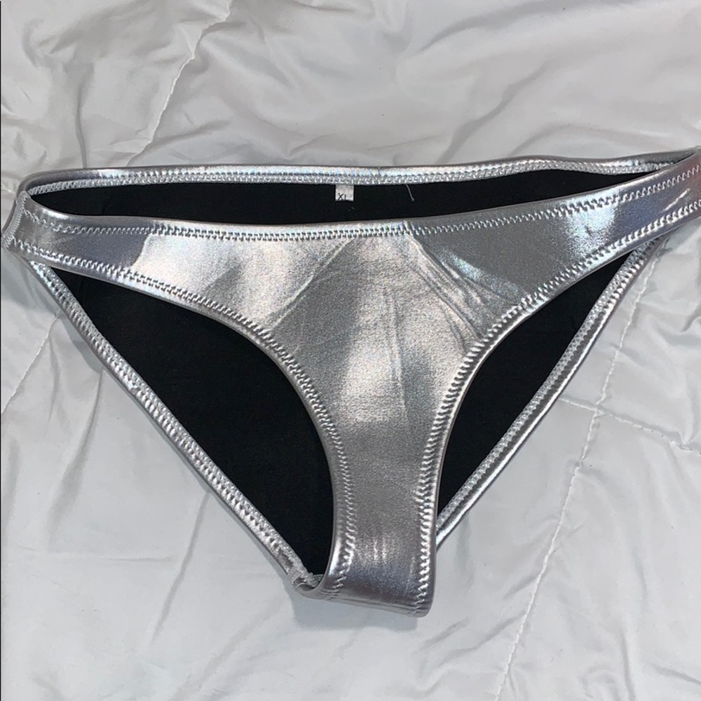 Silver bathing suit bottom.